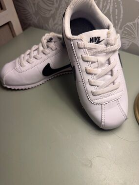 Nike Kids White Sneakers with Black Swoosh